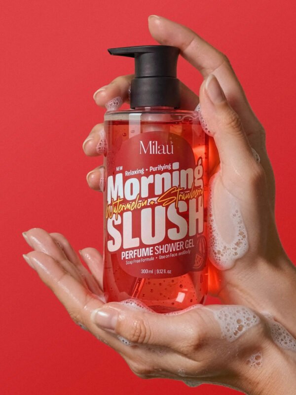 Hands lathering Milau Watermelon & Strawberry perfume shower gel with foam